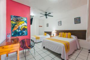 Voodi või voodid majutusasutuse Hotel Meson de Mita toas