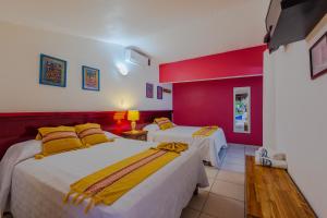 Voodi või voodid majutusasutuse Hotel Meson de Mita toas