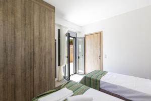 A bed or beds in a room at Villa Zoe , south Crete , Triopetra
