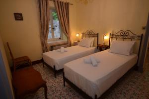 Ένα ή περισσότερα κρεβάτια σε δωμάτιο στο Ampelaki Blue