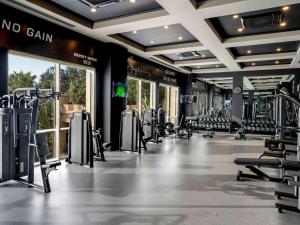 a gym with a lot of treadmills and machines at Rixos Premium Belek - The Land of Legends Access in Belek