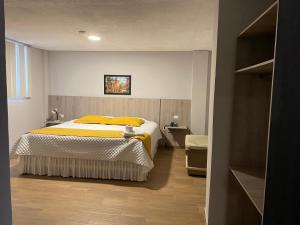 A bed or beds in a room at Terraza Dreams