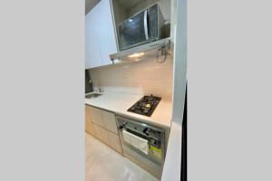 Η κουζίνα ή μικρή κουζίνα στο Cómodo apartamento con excelente ubicación