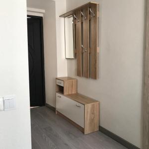 a room with a counter and a cabinet and a mirror at MaryLu home in Lviv +5 photos