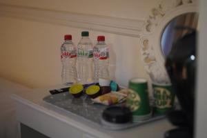 a counter with two bottles of coca cola on it at The Fleet Inn in Killybegs