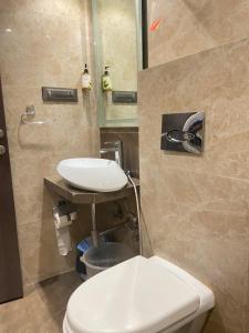 Koupelna v ubytování Hotel Oyster Suite Andheri West