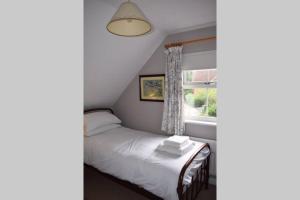 Un ou plusieurs lits dans un hébergement de l'établissement Stylish and modern home in Uppingham, Rutland