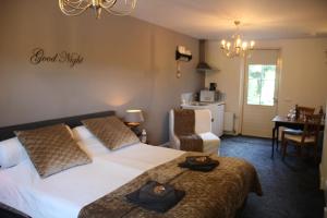 Ένα ή περισσότερα κρεβάτια σε δωμάτιο στο Studio Bed and Breakfast Zaans Moment