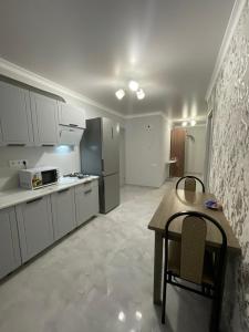 A kitchen or kitchenette at Guest house Anaida