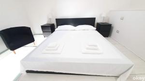 Posteľ alebo postele v izbe v ubytovaní Urban Cottage - Casa Vacanze Bari