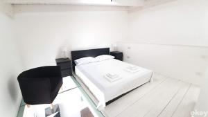 Posteľ alebo postele v izbe v ubytovaní Urban Cottage - Casa Vacanze Bari