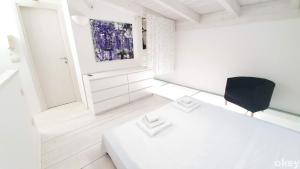 Posteľ alebo postele v izbe v ubytovaní Urban Cottage - Casa Vacanze Bari
