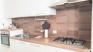 Kuchyňa alebo kuchynka v ubytovaní Urban Cottage - Casa Vacanze Bari + 10 fotografií