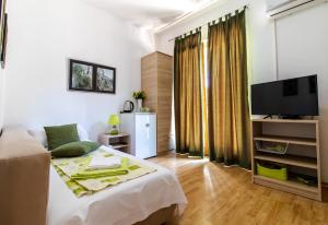 Posteľ alebo postele v izbe v ubytovaní Rooms Bačić