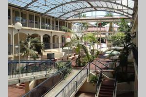 arium of a building with a glass ceiling at LOCATION LIFESTYLE CONVENIENCE! WIFI NETFLIX WINE in Perth