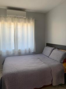 En eller flere senge i et værelse på Casa da bela vista