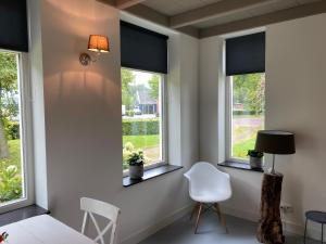 Posezení v ubytování B&B Boerderij De Vaete - Duurzaam genieten in de zak van Zuid-Beveland