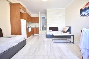 Posteľ alebo postele v izbe v ubytovaní Konomi Residence