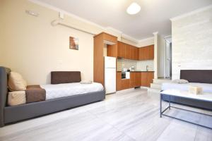 Kuchyňa alebo kuchynka v ubytovaní Konomi Residence