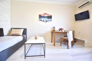 Posteľ alebo postele v izbe v ubytovaní Konomi Residence