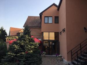 a christmas tree in front of a building at На Круговій in Zaporozhye