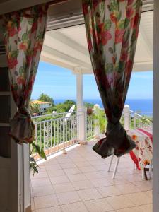 Ein Balkon oder eine Terrasse in der Unterkunft Villa des îles