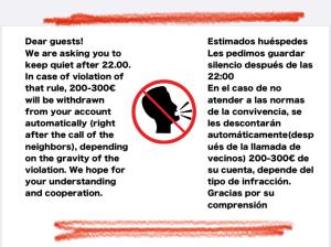 a poster with a sign that says keep quiet after at Plaza Sainetero in Valencia