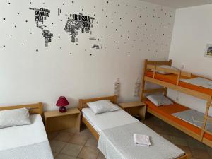 Postel nebo postele na pokoji v ubytování Rooms Deny