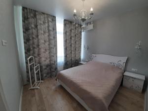 Posteľ alebo postele v izbe v ubytovaní Квартира у моря Аркадия в 48 жемчужине