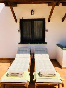 Postelja oz. postelje v sobi nastanitve Guest apartment in Collserola Natural Park close to Barcelona