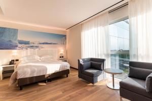 Postel nebo postele na pokoji v ubytování Life Hotel