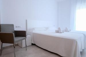Postel nebo postele na pokoji v ubytování Sal Mar Suites