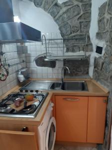 A kitchen or kitchenette at Tempesta Home