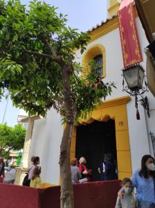 a group of people standing outside of a building at Apartamentos CENTRO HISTORICO in Málaga