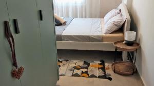 Postel nebo postele na pokoji v ubytování ISALO Villa