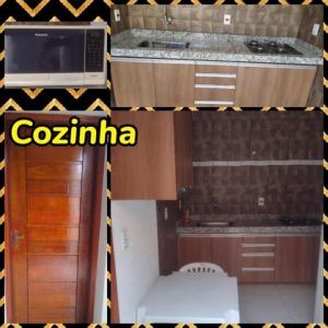 a kitchen with a microwave and a counter top at Casa Camargo 2 - Lugar Aconchegante in Olímpia