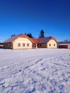 Apartmány v Pošumaví during the winter