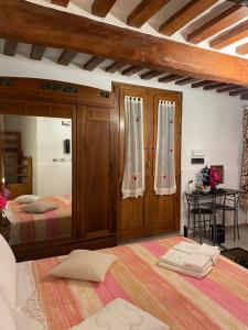 A bed or beds in a room at Affittacamere Mirella
