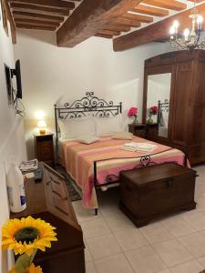 A bed or beds in a room at Affittacamere Mirella