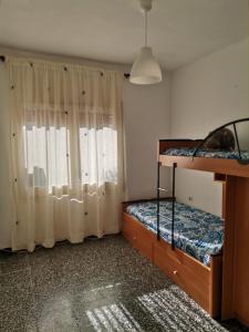 Cama o camas de una habitación en Carrer Esparreguera