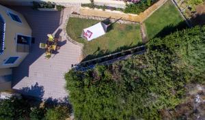 an overhead view of a yard with a house at Sunny hideaway Residence Close to the Nature in Argoulidhés
