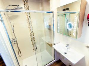 a bathroom with a shower and a sink at Urlaub in Andreasberg in Sankt Andreasberg