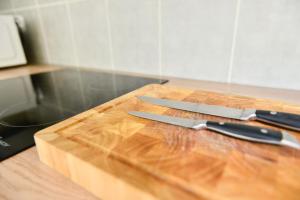 A cozinha ou cozinha compacta de L’appartement - Jardin Secret
