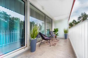 Balkon lub taras w obiekcie Lividus Apart Park by Lev&Sons Apartments