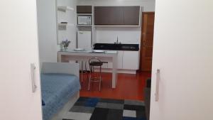 Kuchyň nebo kuchyňský kout v ubytování Apartamento Paraíso Gramado - 900m da Rua Coberta