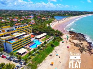 an overhead view of a beach and the ocean at Brisas de Tabatinga Flat in Conde