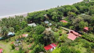 an aerial view of a house next to the beach at Casa Shaquir H - Coastal Bliss Oasis in Puerto Viejo