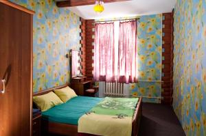 Postel nebo postele na pokoji v ubytování Apart-Hotel Parasolka