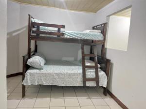 Voodi või voodid majutusasutuse Departamentos Patricia toas