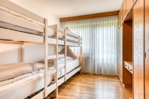 Letto o letti in una camera di Panoramavilla Bludenz by A-Appartments